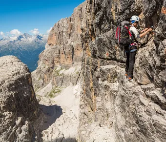 Climber on a via ferrata Dolomites, InfoDolomites